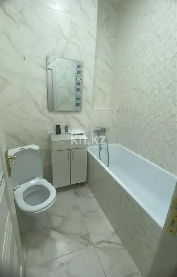 Продажа 1-комнатной квартиры, 38 м², ул. Туркестан, дом  14а в Астане - фото 5