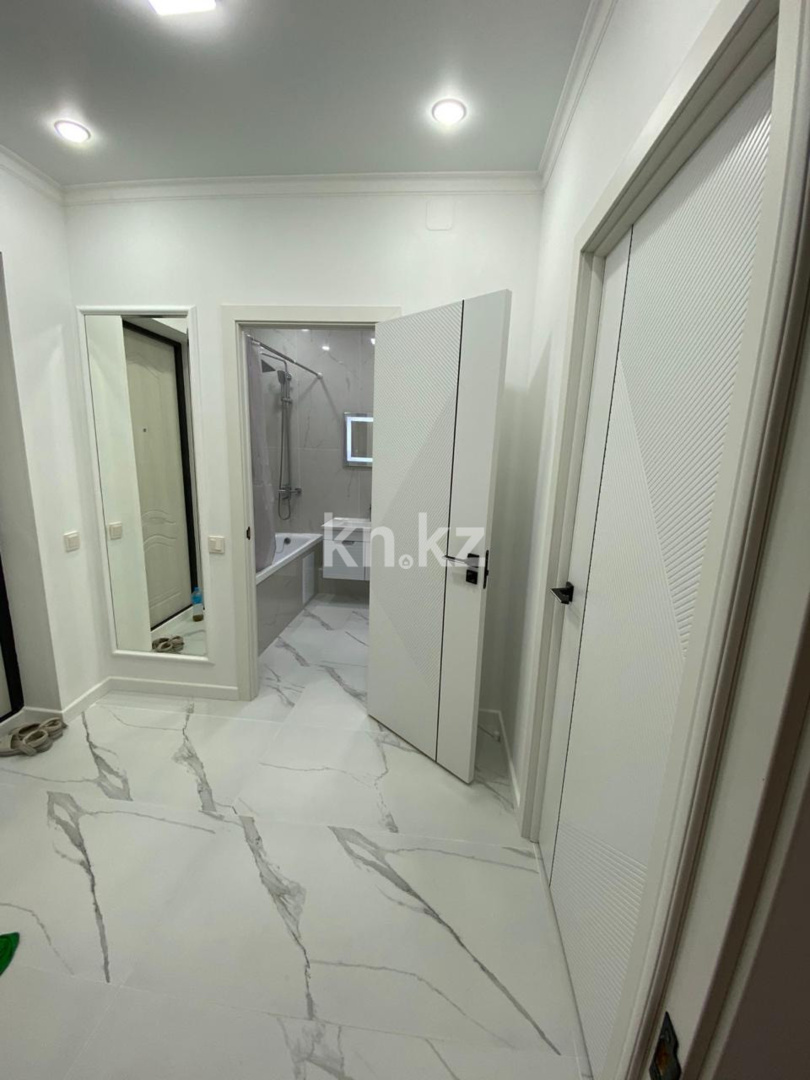 Аренда 1-комнатной квартиры, 52 м² в Алматы - фото 10