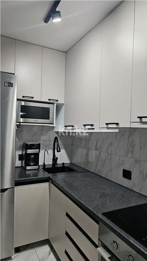 Продажа 2-комнатной квартиры, 53 м², ул. Ашимова, дом  28 в Караганде - фото 3