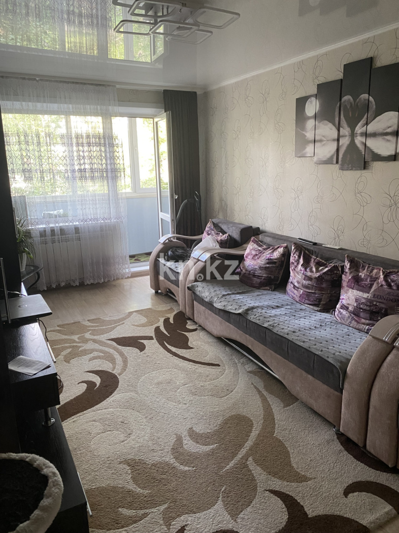 Продажа 3-комнатной квартиры, 62 м², 22 мкр., дом  25 в Караганде - фото 4