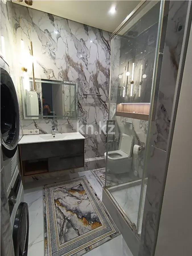 Продажа 2-комнатной квартиры, 50 м², ул. Шыганак, дом  1 в Астане - фото 4