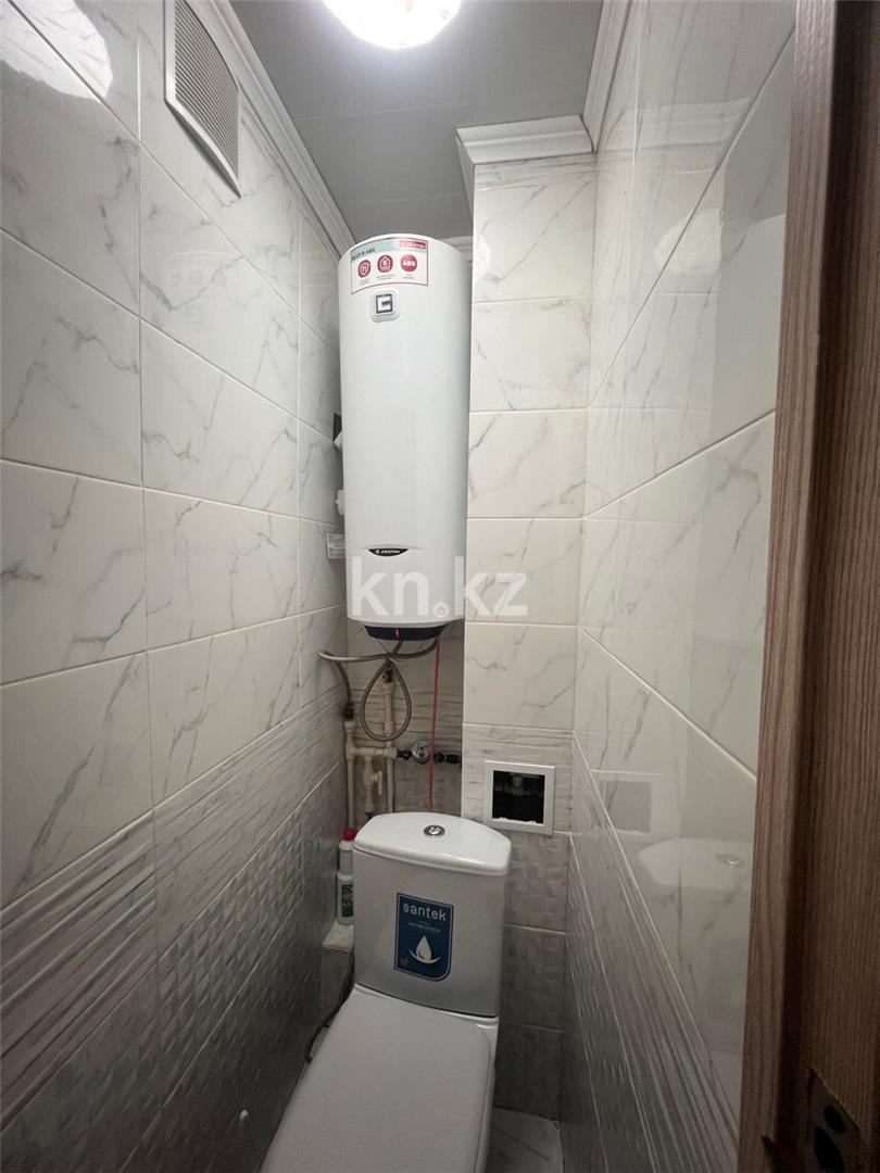 Продажа 3-комнатной квартиры, 61 м², 18 мкр., дом  22 в Караганде - фото 11