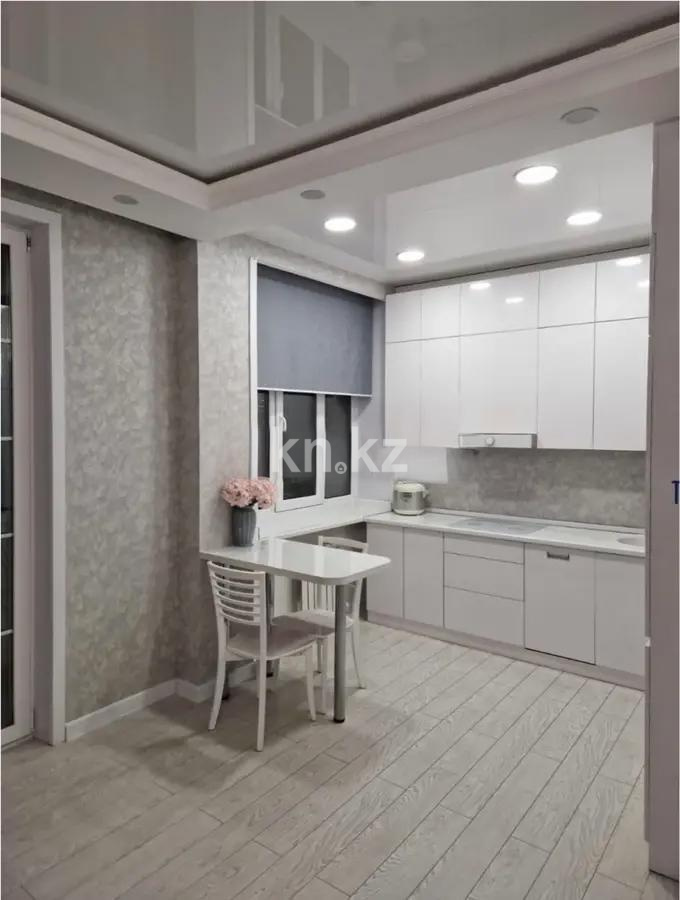 Продажа 4-комнатной квартиры, 117 м², ул. Омарова, дом  27 в Астане - фото 5