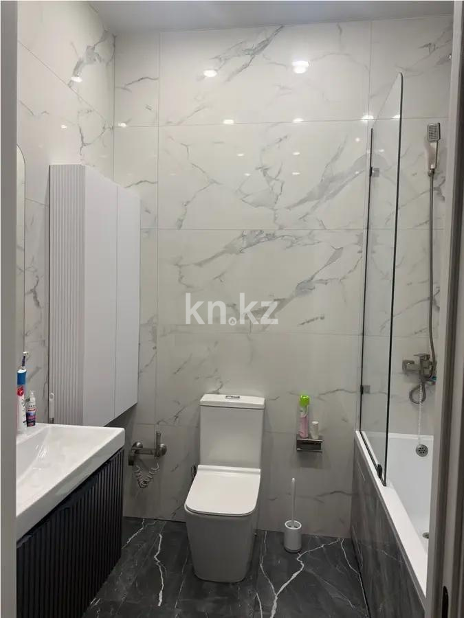 Продажа 4-комнатной квартиры, 120 м², ул. Омарова, дом  27/1 в Астане - фото 6
