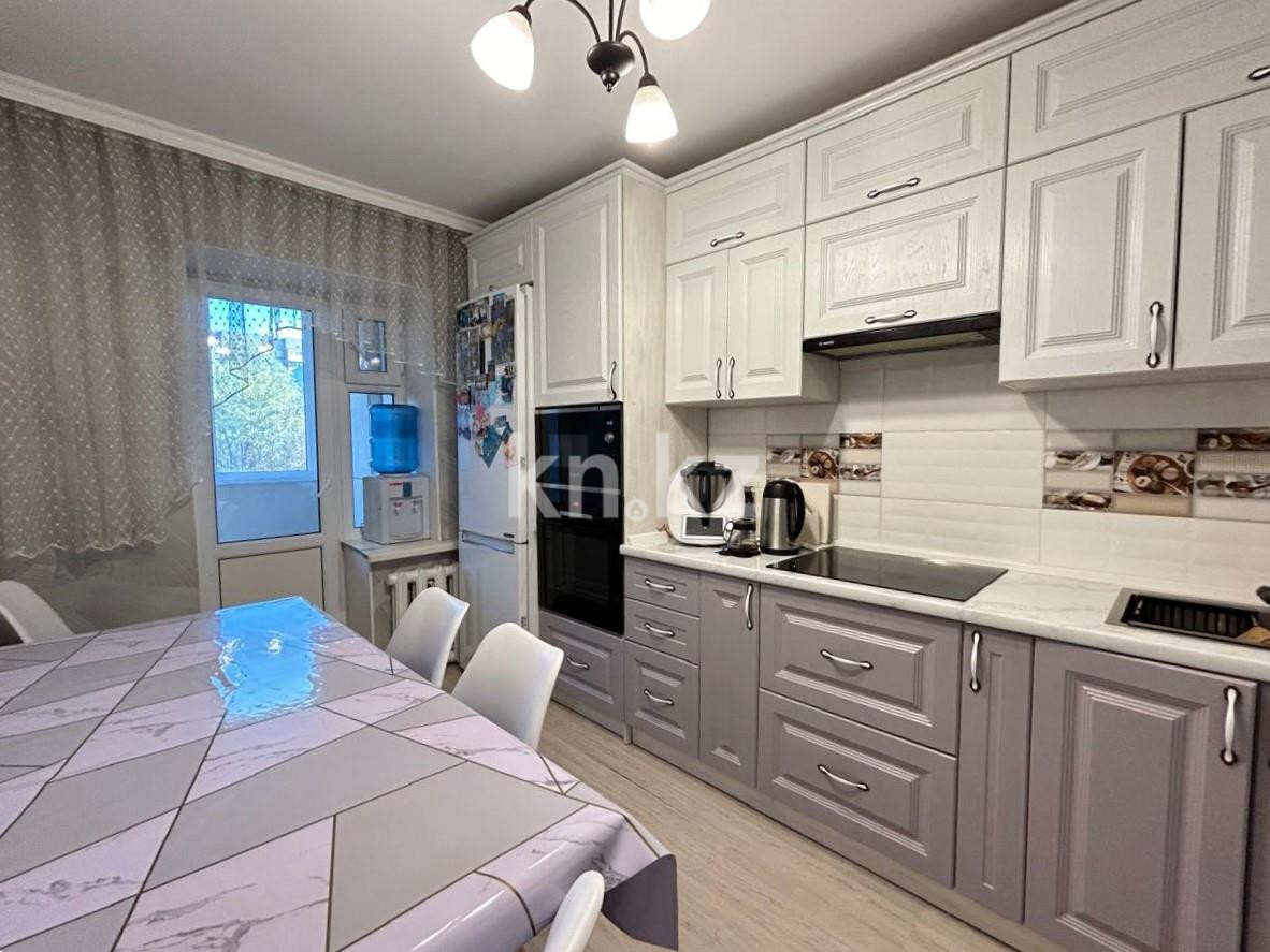 Продажа 5-комнатной квартиры, 107 м², ул. Муканова в Караганде - фото 24