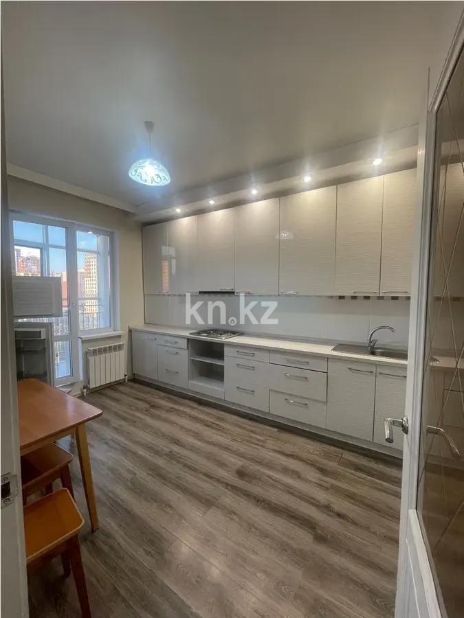 Продажа 1-комнатной квартиры, 49 м², пр. Республики, дом  42 в Караганде - фото 2