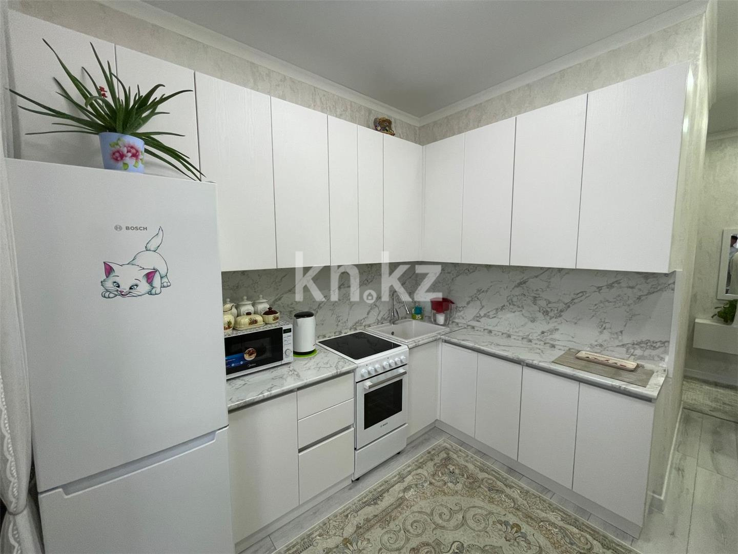 Продажа 2-комнатной квартиры, 65 м², ул. Букетова в Караганде - фото 5