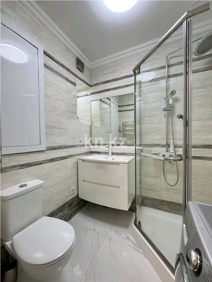 Продажа 2-комнатной квартиры, 57 м², мкр-н Аксай-5, дом  25 в Алматы - фото 3