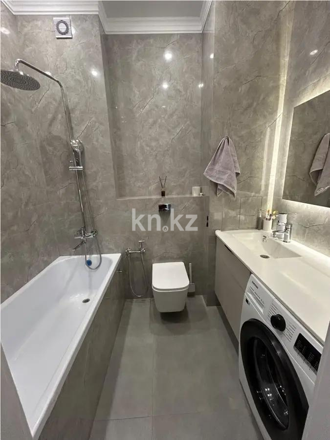 Продажа 2-комнатной квартиры, 60 м², ул. Омарова, дом  19 в Астане - фото 6