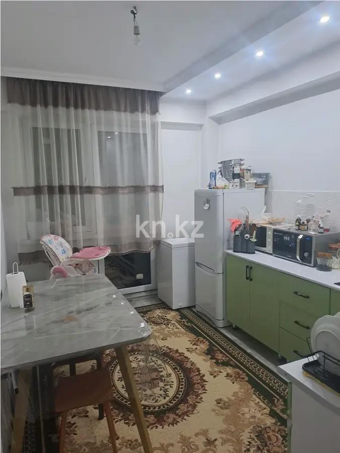 Продажа 2-комнатной квартиры, 57 м², ул. Жунисова, дом  12 в Алматы - фото 2