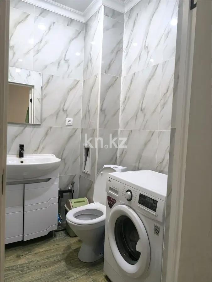 Продажа 2-комнатной квартиры, 73 м², пр. Кошкарбаева, дом  15 в Астане - фото 4