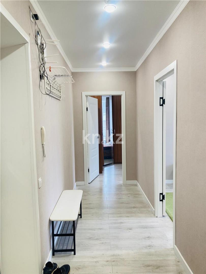 Продажа 2-комнатной квартиры, 55 м², 137 учетный квартал в Караганде - фото 14