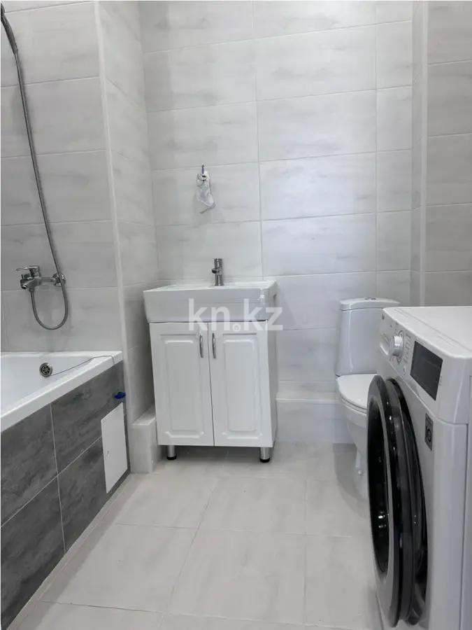 Продажа 2-комнатной квартиры, 47 м², ул. Толе би, дом  59 в Астане - фото 4