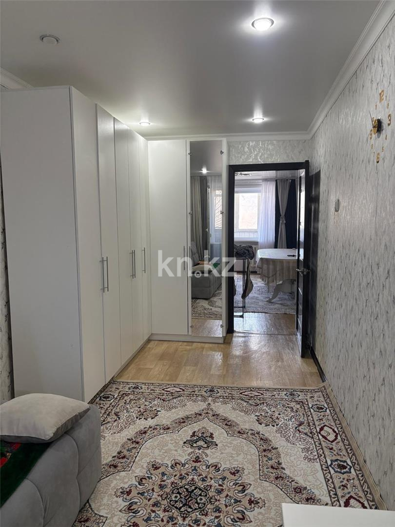 Продажа 2-комнатной квартиры, 48 м², пр. Строителей в Караганде - фото 4