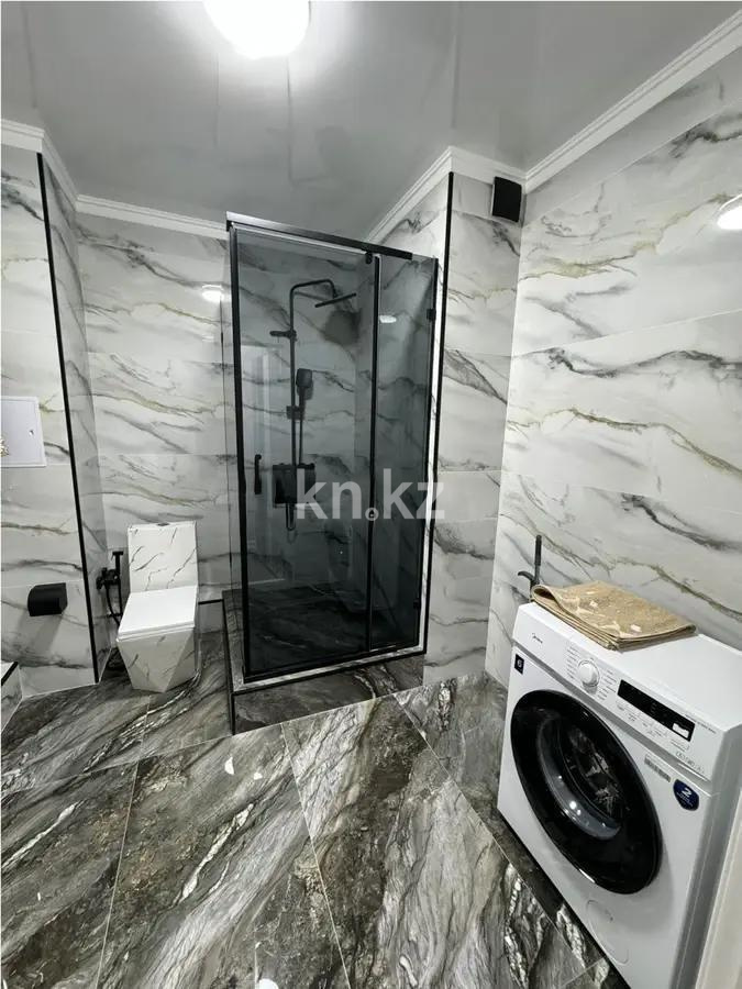 Продажа 2-комнатной квартиры, 55 м², ул. Жандосова, дом  94а в Алматы - фото 4