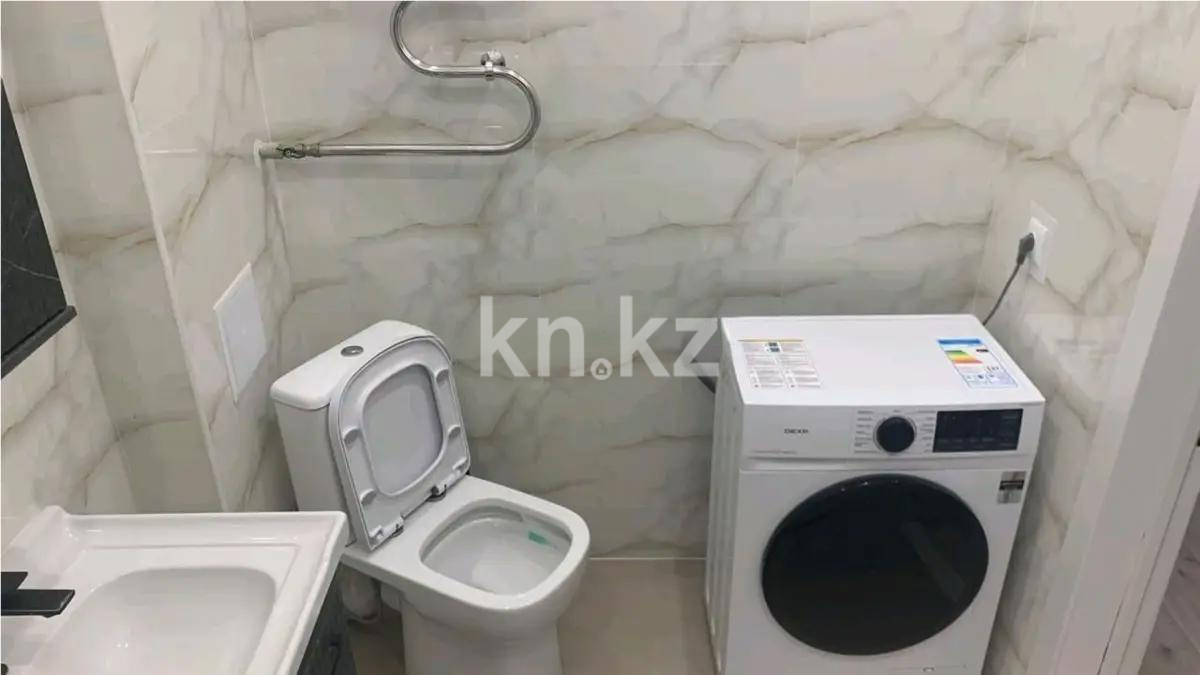 Продажа 1-комнатной квартиры, 38 м², ул. Омарова, дом  12в в Астане - фото 2