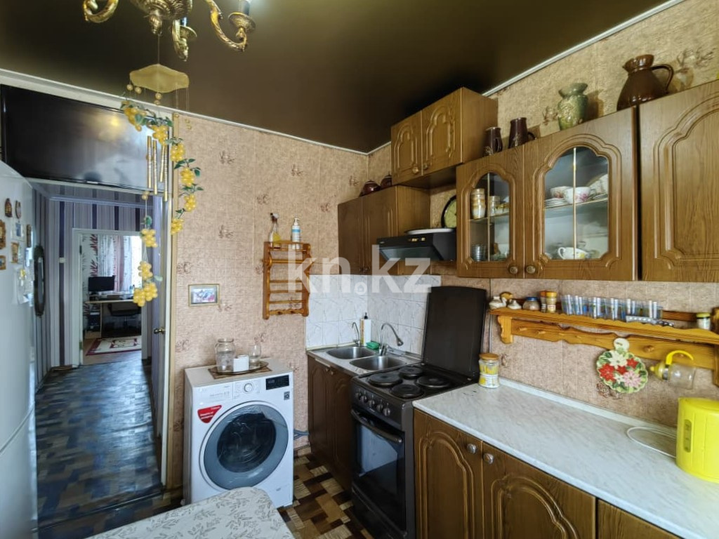 Продажа 4-комнатной квартиры, 77 м², ул. Язева, дом  10 в Караганде - фото 24