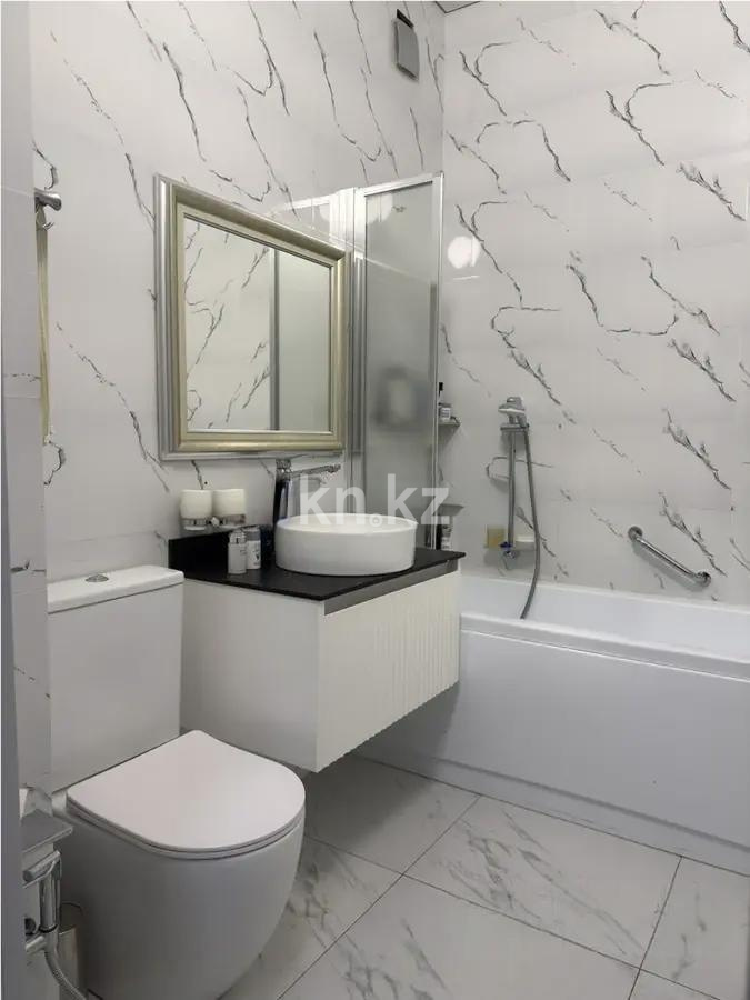 Продажа 4-комнатной квартиры, 118 м², ул. Калдаякова, дом  58 в Астане - фото 5