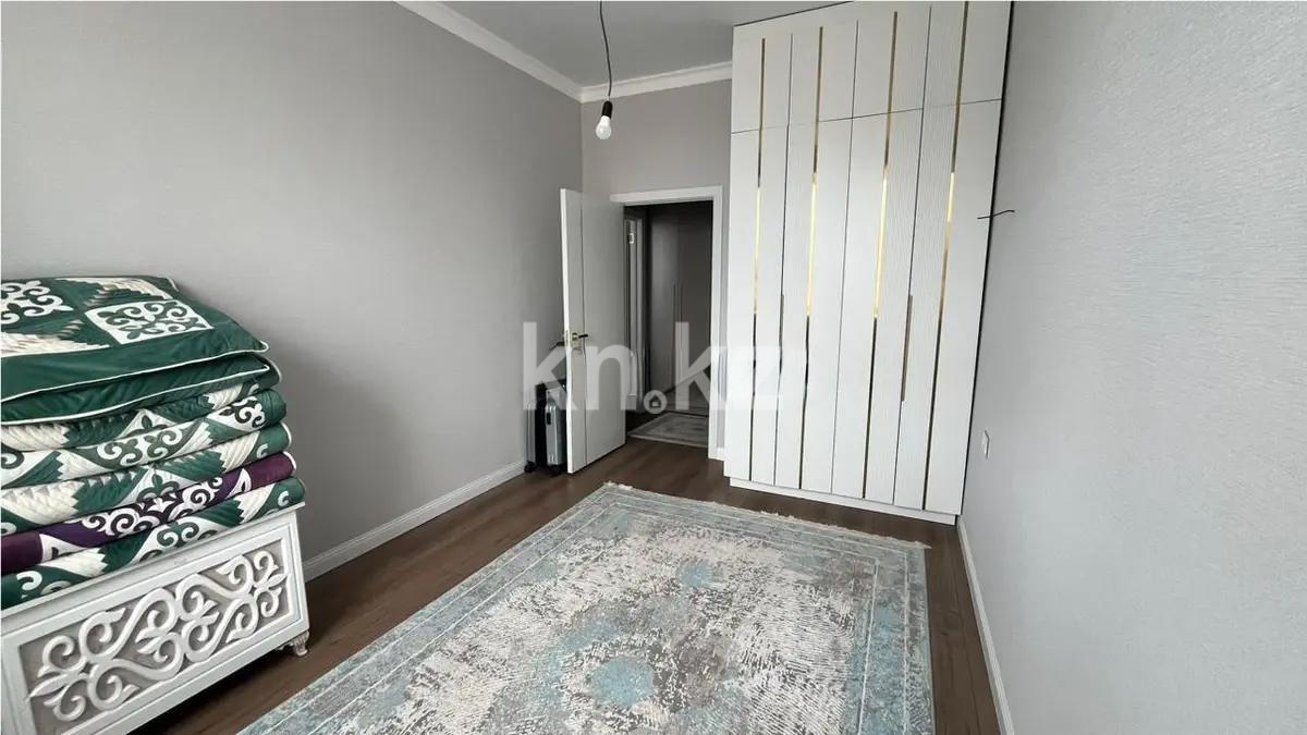 Продажа 2-комнатной квартиры, 56 м², ул. Толе би, дом  12/1 в Астане - фото 2