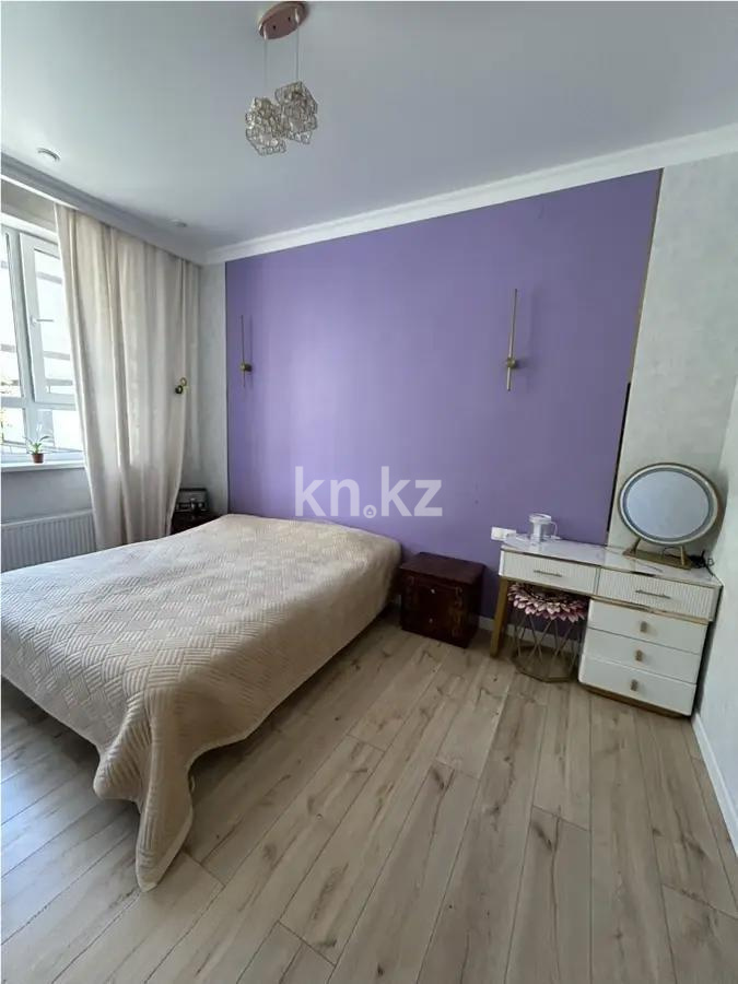 Продажа 2-комнатной квартиры, 52 м², ул. Толе би, дом  12/1 в Астане - фото 2