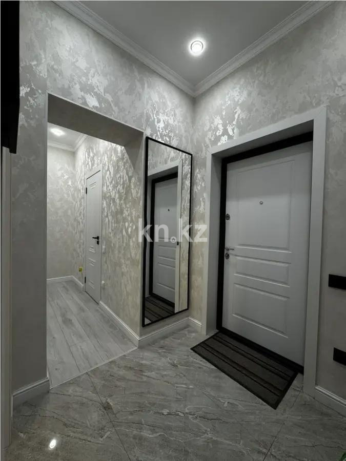 Продажа 2-комнатной квартиры, 52 м², пр. Республики, дом  49 в Караганде - фото 5