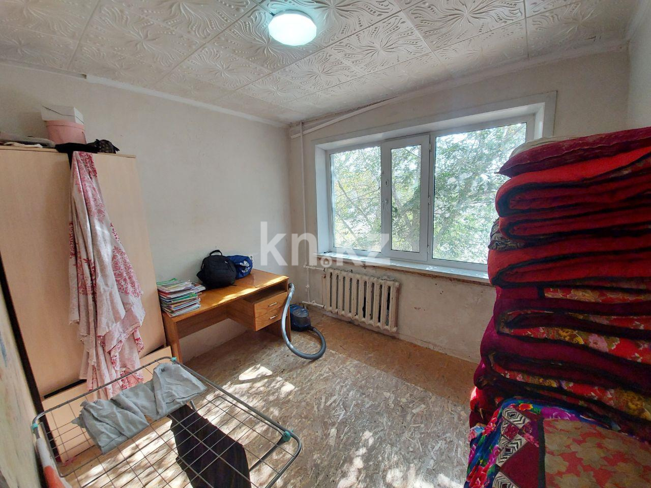 Продажа 3-комнатной квартиры, 63 м², мкр-н 15, дом  2 в Караганде - фото 5