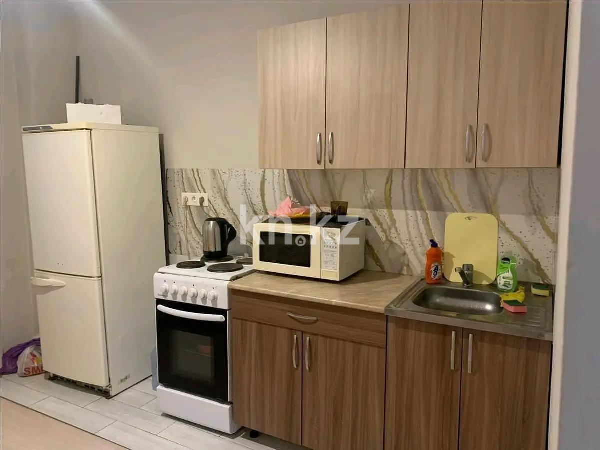 Продажа 1-комнатной квартиры, 37 м², ул. Омарова, дом  27 в Астане - фото 2