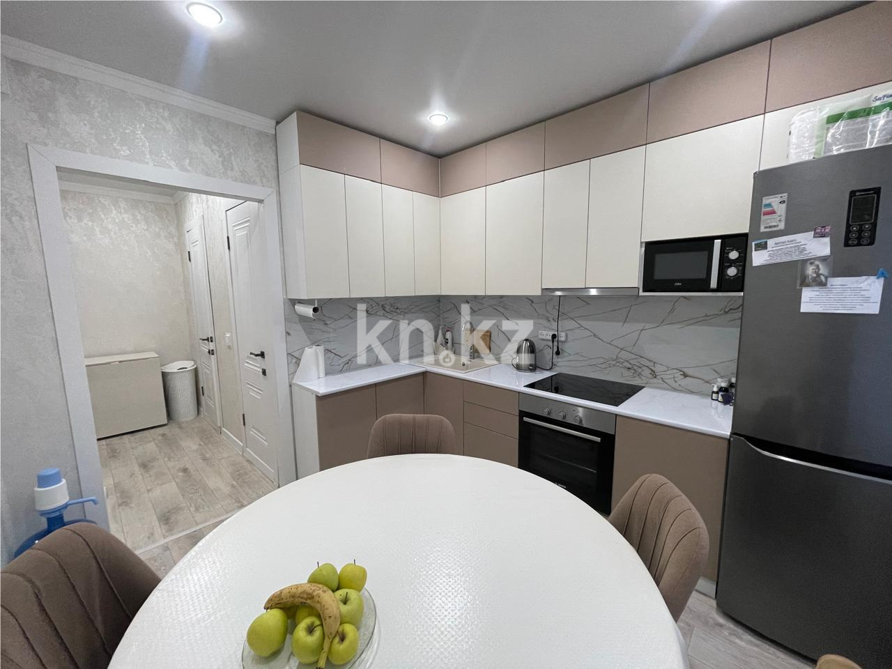 Продажа 2-комнатной квартиры, 54 м², мкр-н Гульдер-1 в Караганде - фото 9