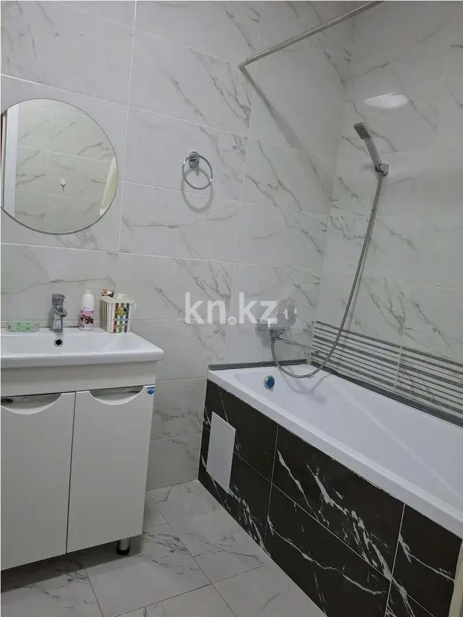 Продажа 1-комнатной квартиры, 48 м², ул. Омарова, дом  3/1 в Астане - фото 3