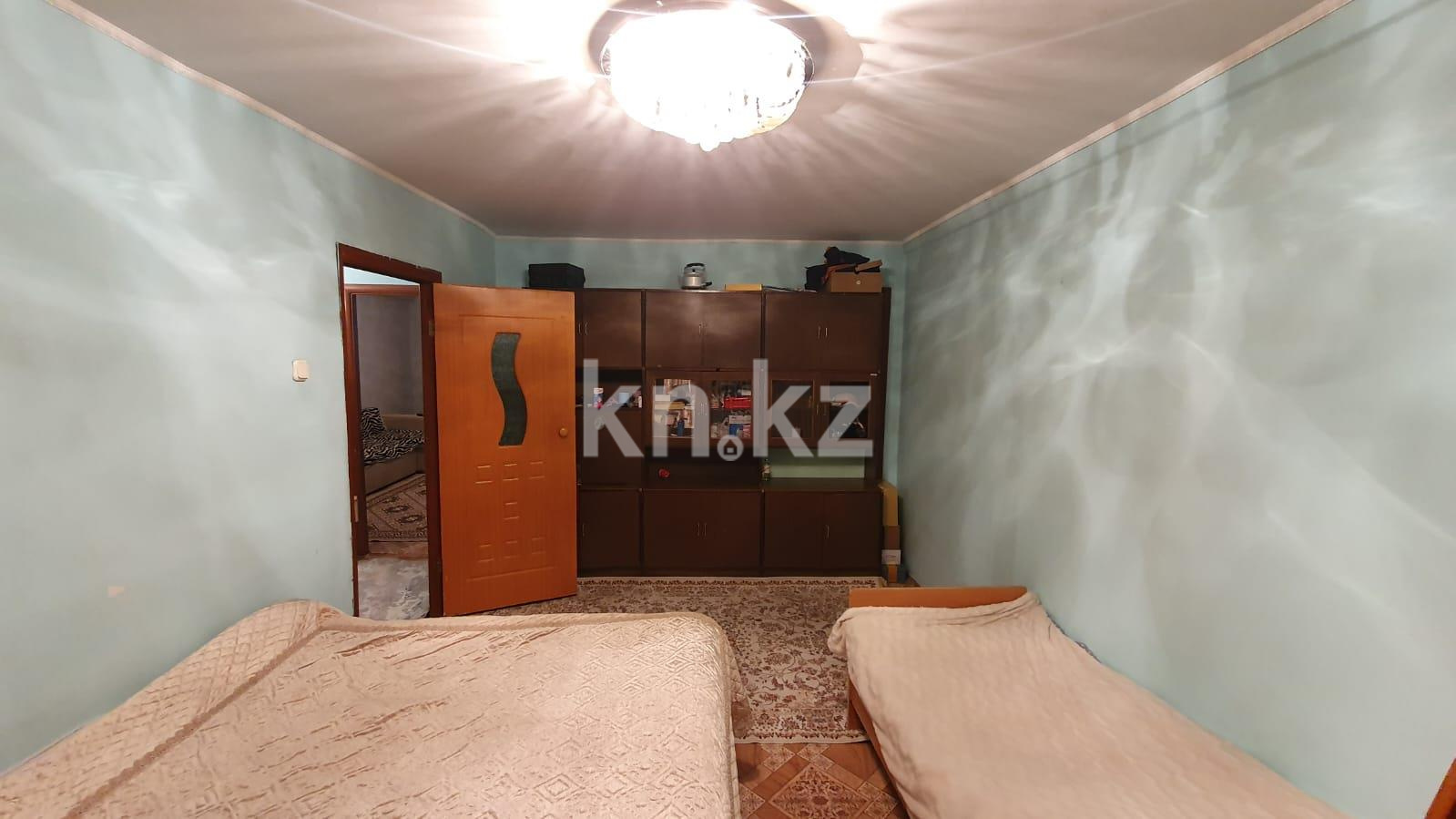 Продажа 3-комнатной квартиры, 59 м², ул. Жекибаева в Караганде - фото 4