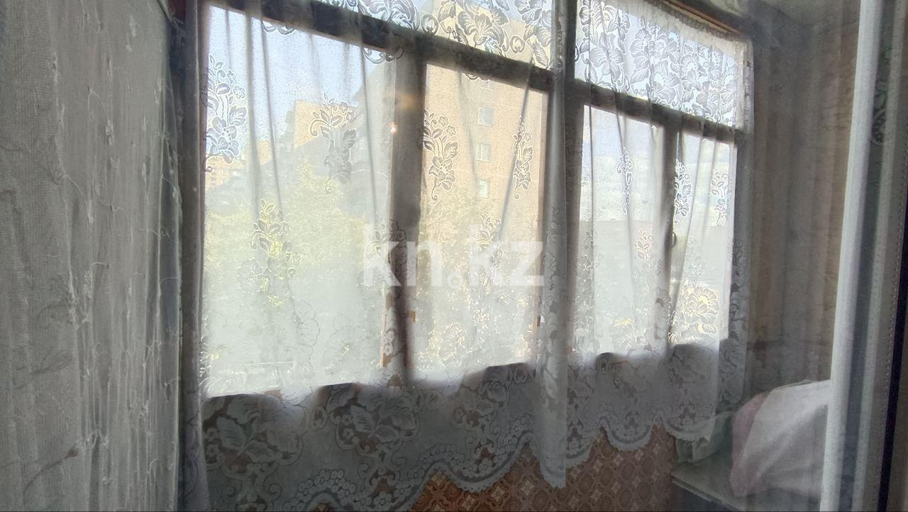 Продажа 1-комнатной квартиры, 33 м², 15 мкр., дом  30 в Караганде - фото 3