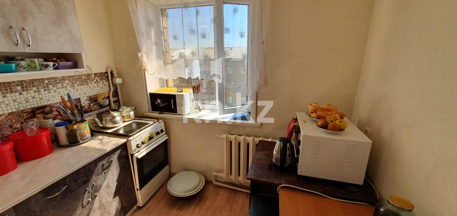 Продажа 2-комнатной квартиры, 50 м², ул. Жекибаева в Караганде - фото 4