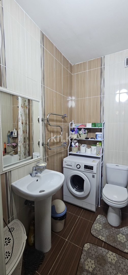 Продажа 2-комнатной квартиры, 65 м², ул. Толе би в Алматы - фото 6