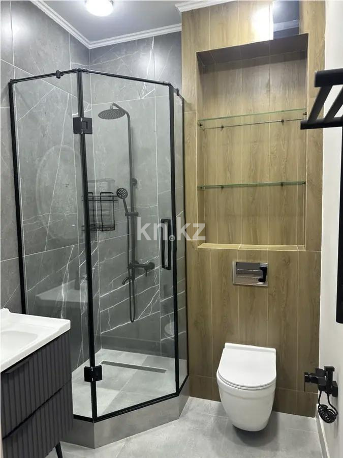 Продажа 1-комнатной квартиры, 59.2 м² в Алматы - фото 4