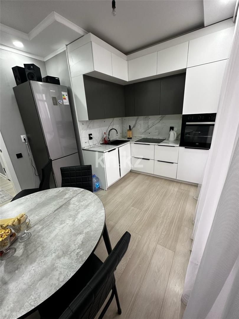 Продажа 2-комнатной квартиры, 65 м², ул. Сатыбалдина в Караганде - фото 8