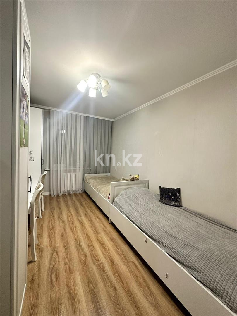 Продажа 3-комнатной квартиры, 65 м², ул. Муканова, дом  80 в Караганде - фото 4