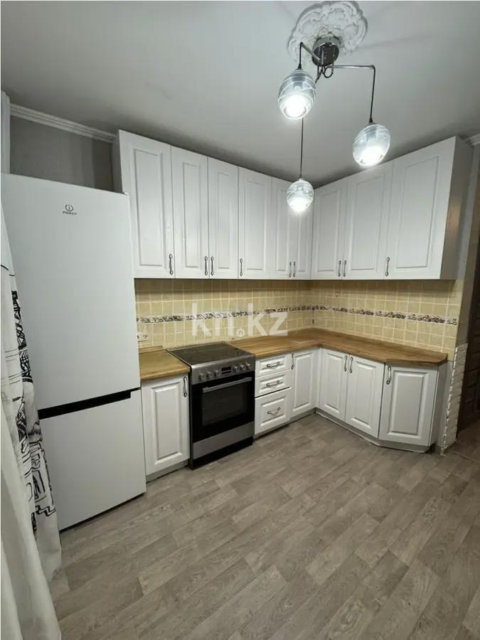 Продажа 2-комнатной квартиры, 54 м², мкр-н Гульдер-1, дом  9 в Караганде - фото 5