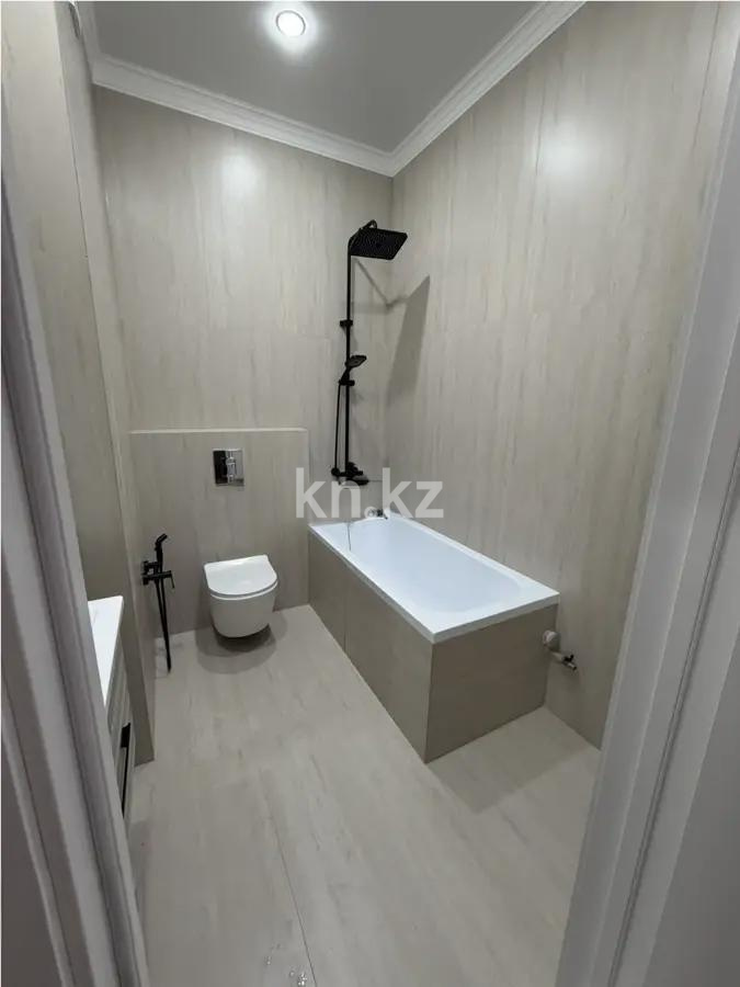 Продажа 2-комнатной квартиры, 52 м², ул. Сыганак, дом  28 в Астане - фото 4