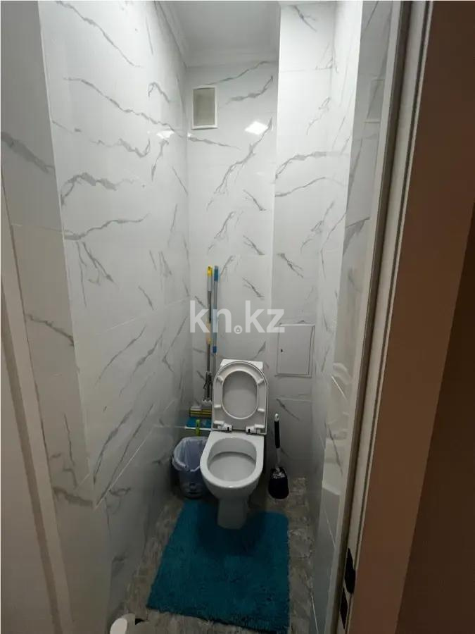 Продажа 1-комнатной квартиры, 36 м², пр. Кошкарбаева, дом  80/1 в Астане - фото 4