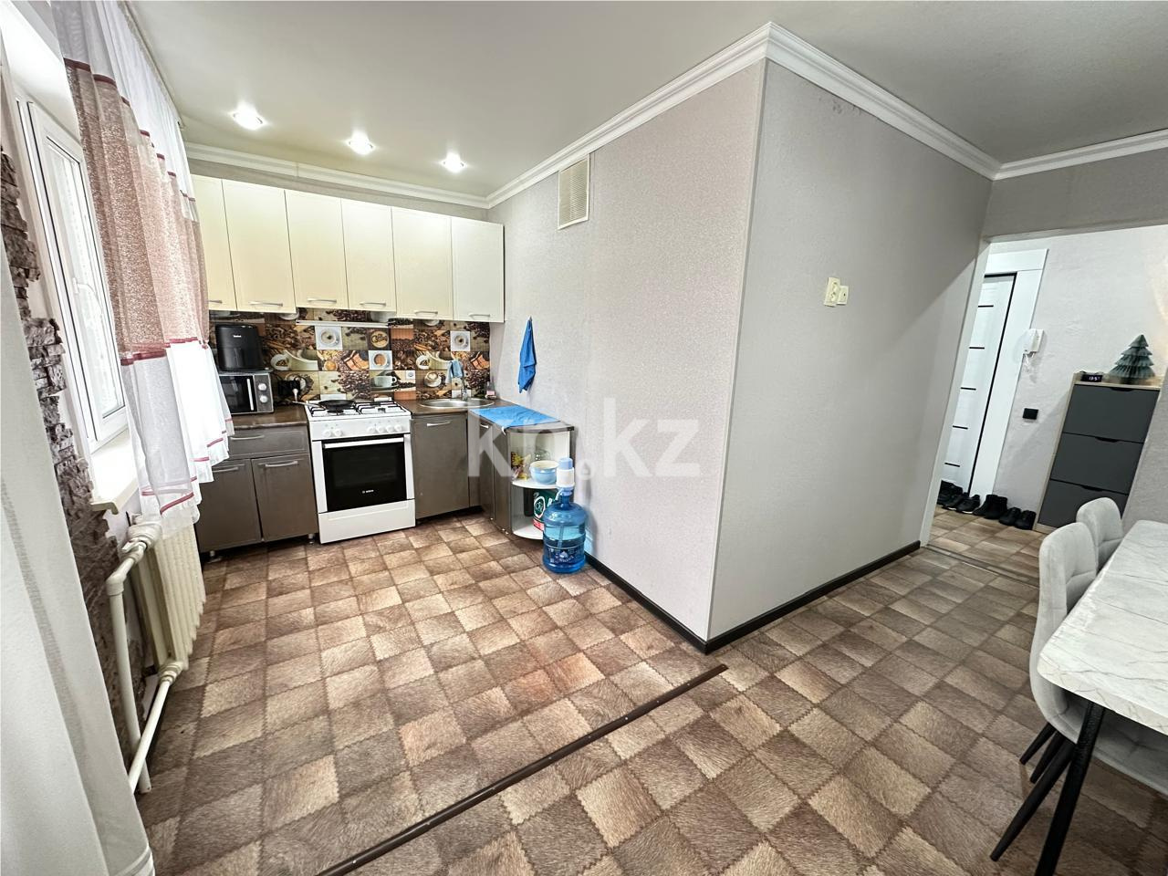 Продажа 4-комнатной квартиры, 61 м², 22 мкр. в Караганде - фото 11