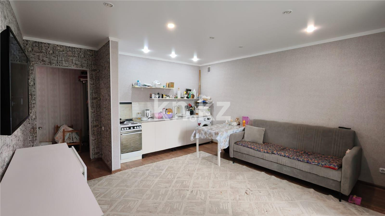 Продажа 2-комнатной квартиры, 49 м², ул. Сарыарка в Караганде - фото 2