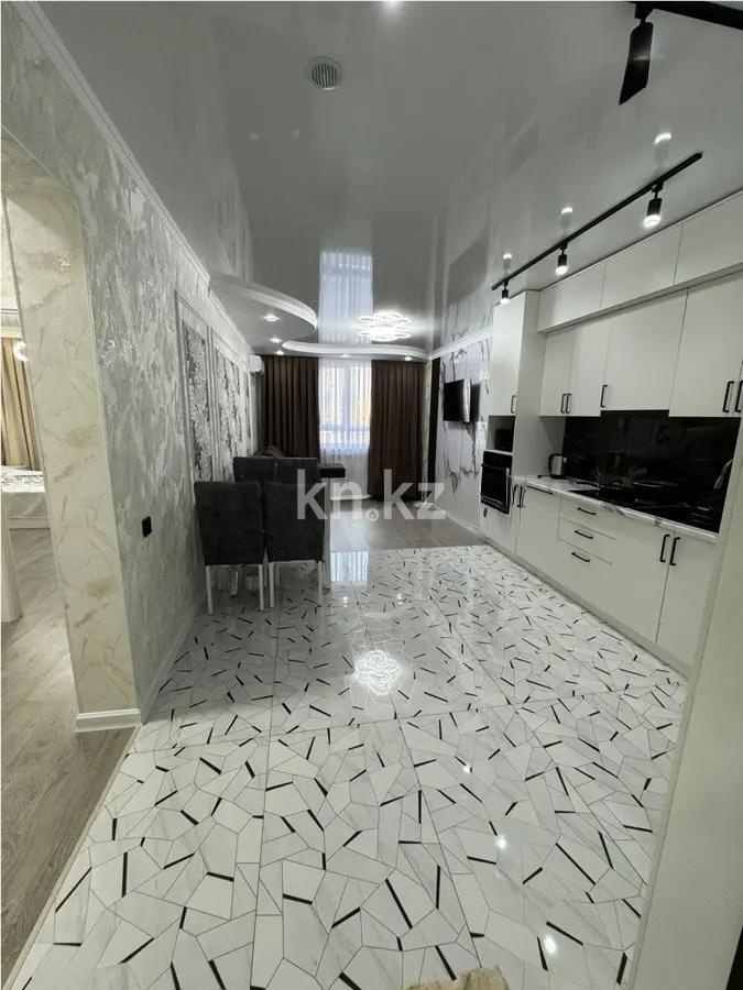 Продажа 2-комнатной квартиры, 55 м², ул. Жандосова, дом  94а в Алматы - фото 2