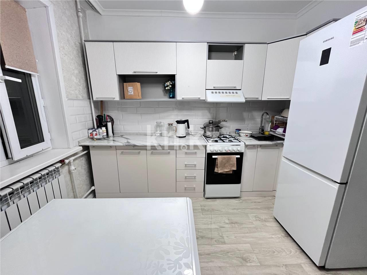 Продажа 2-комнатной квартиры, 53 м², мкр. Гульдер-1 в Караганде - фото 9