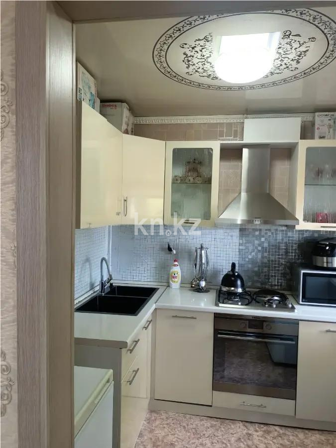 Продажа 4-комнатной квартиры, 77 м² в Караганде - фото 4