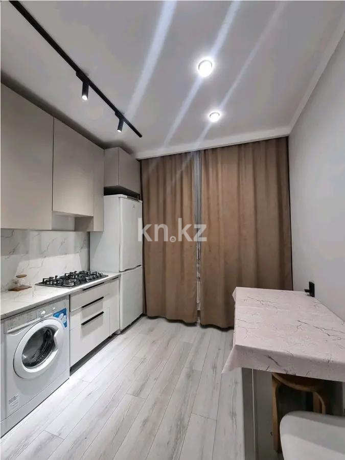 Продажа 1-комнатной квартиры, 42 м², мкр-н Аксай-4, дом  79 в Алматы - фото 2