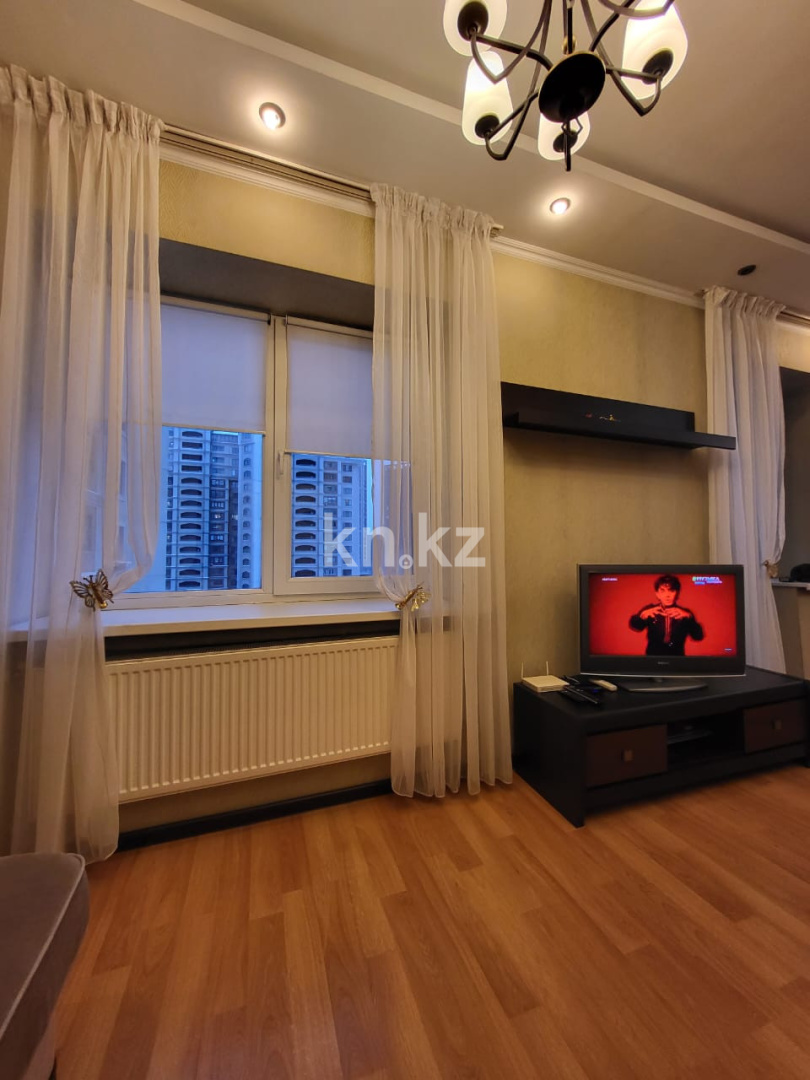 Аренда 1-комнатной квартиры, 50 м², ул. Ходжанова, дом  76 - пр. Аль-Фараби в Алматы - фото 12