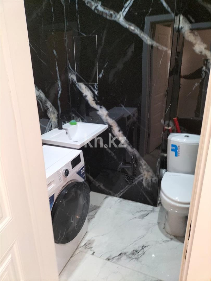 Продажа 2-комнатной квартиры, 66 м², ул. Нарикбаева в Астане - фото 9