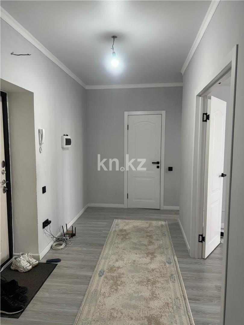 Продажа 2-комнатной квартиры, 55 м², ул. Сыганак в Астане - фото 5