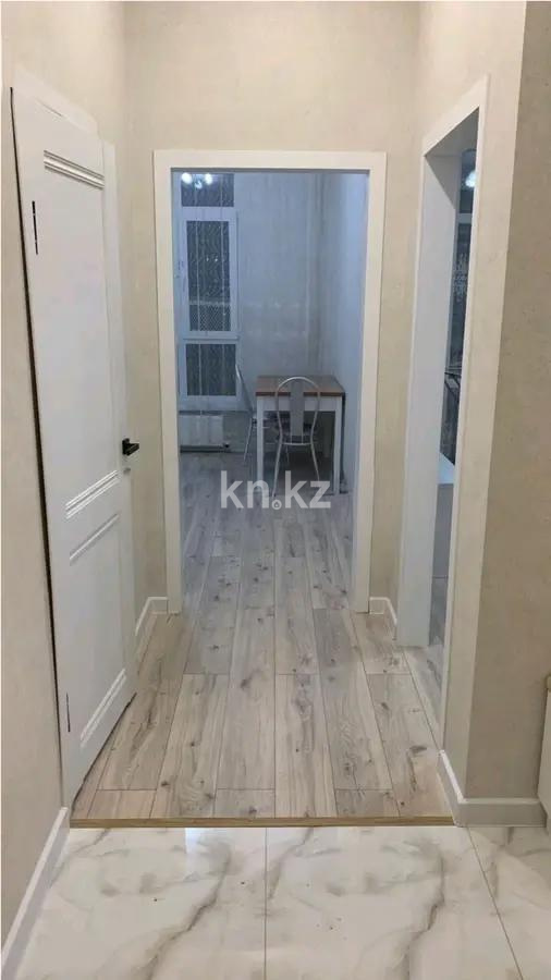 Продажа 1-комнатной квартиры, 38 м², ул. Омарова, дом  12в в Астане - фото 4