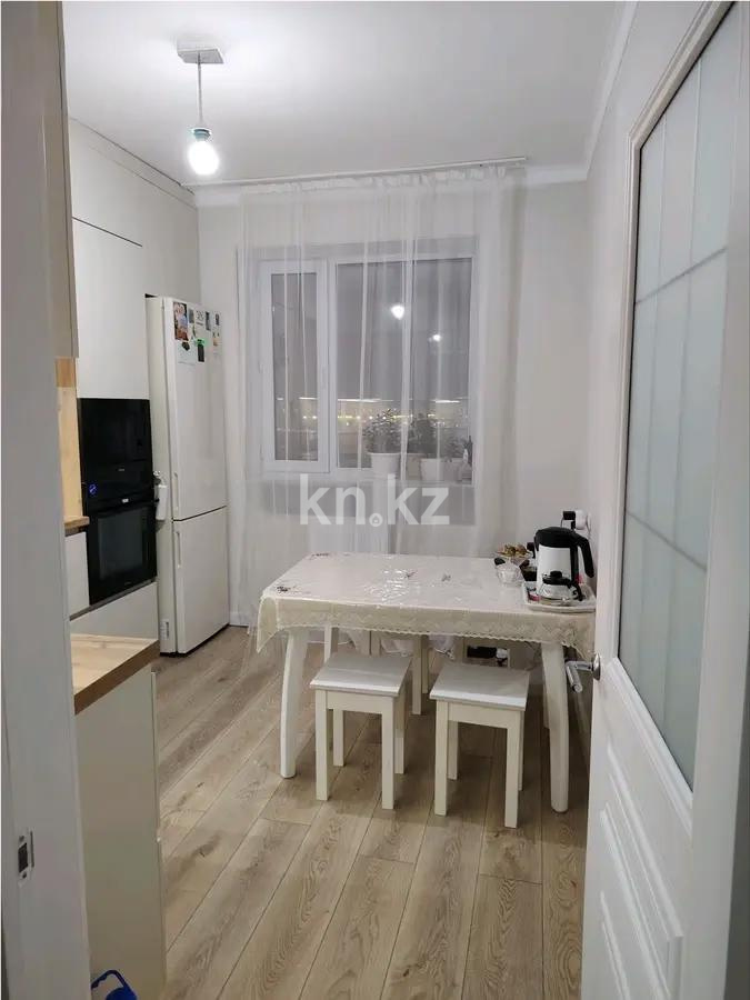 Продажа 2-комнатной квартиры, 70 м², ул. Момышулы, дом  28 в Караганде - фото 4